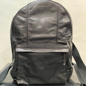 Cole Haan black pebbled leather backpack.